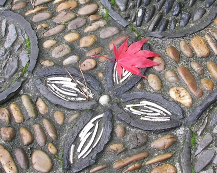Sun Yat-Sen Garden, maple leaf on paving
